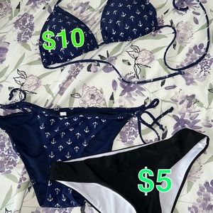 Blue anchor bikini and black bikini bottoms